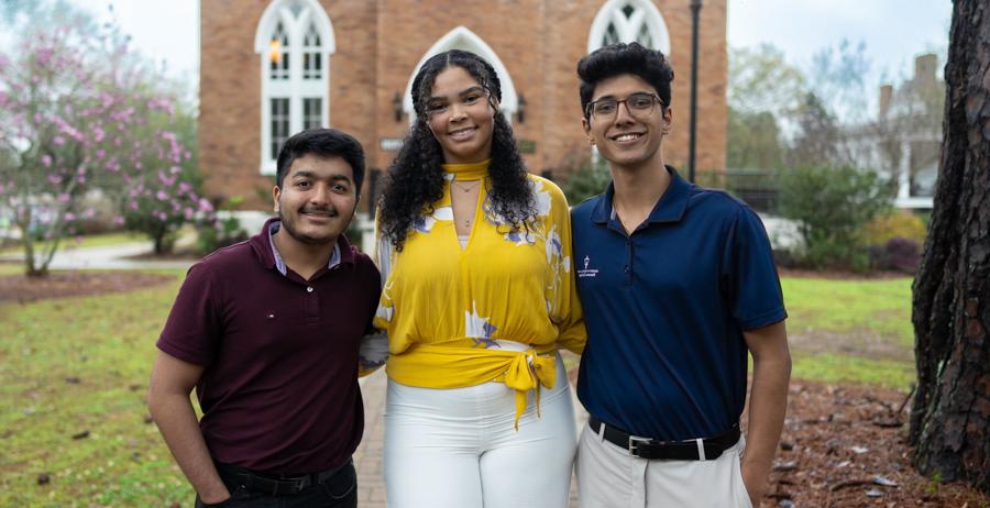 Three University of South Alabama Honor College students, from left, Suhas Patil, Kaitlyn Riggins and Dev Mehta, recently took third, second and first place in a competition for research posters at the Alabama Academy of Science Conference. data-lightbox='featured'